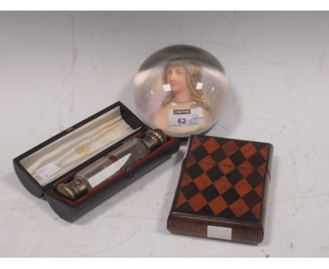 A 19th century parquetry case; an Edwardian double ended scent bottle, cased; an unusual early 20th century paper weight, the