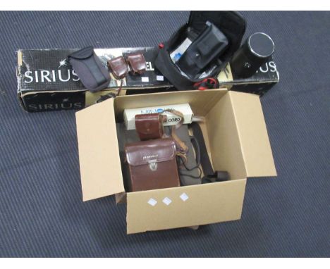 A collection of vintage cameras and photography equipment; together with a boxed tripod