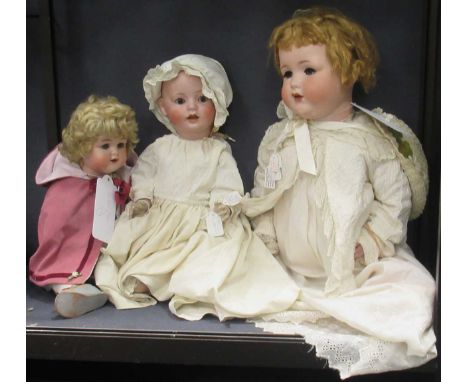 Three large bisque-head dolls: bisque-head doll, Schoenau &amp; Hoffmeister Hanna baby doll, German, c1909, impressed "S*PBH 