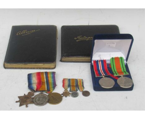 A WWI medal group, complete with miniatures, awarded to Gnr. Henry C. Tucker; together with two period autograph/sketch books