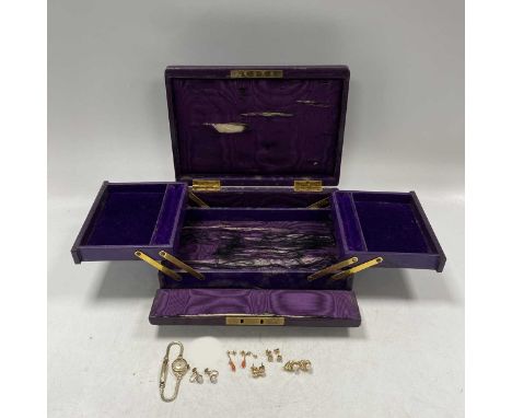 A jewellery box containing a Rotary watch with a 9ct gold case and gold plated bracelet, together with five pairs of earrings