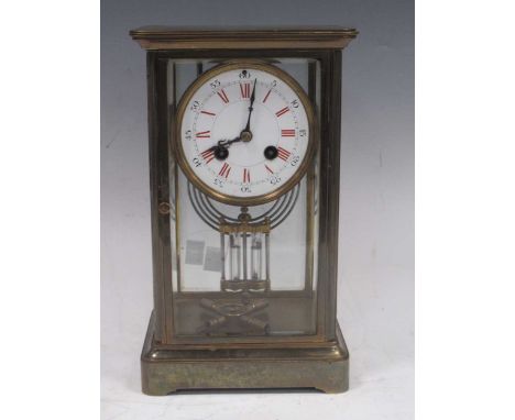 A four-glass mantel clock, lacquered brass case, French gong striking movement, mercury pendulum, circa 1900.Crack to lower d