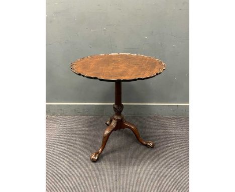 A Chippendale style mahogany tripod table with Pie-crust top and claw and ball feet 71cm x 69cm
