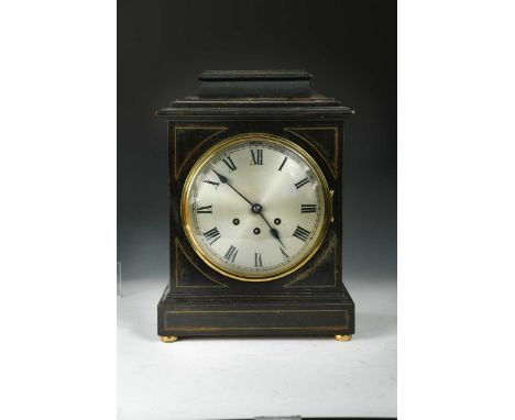 A Regency style ebonised and brass inlaid chiming table clock, with circular steel dial and Roman numerals, German Gustav Bec