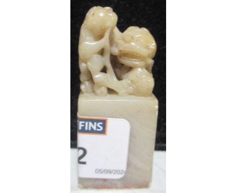 A Chinese soapstone desk seal, late Qing Dynasty, 6cm highThere is a significant chip to the bottom right rear corner and sma