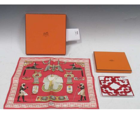 Two items from Hermes Paris, in original boxes,to include a Tutankhamun handkerchief, decorated in Egyptian symbols on a pink