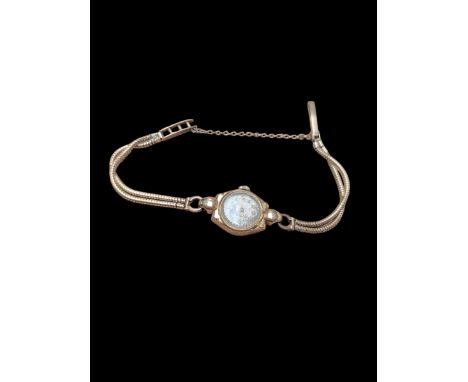 9ct gold cased manual wind ladies wristwatch, on a 9ct gold strapCondition Report:Back case approx 1.65 grams, strap with gla