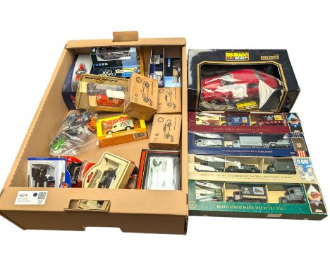 Collection of diecast model vehicles, including Burago Rolls Royce Camargue, Lledo Carry On Collecting and Lledo D-Day and Pe