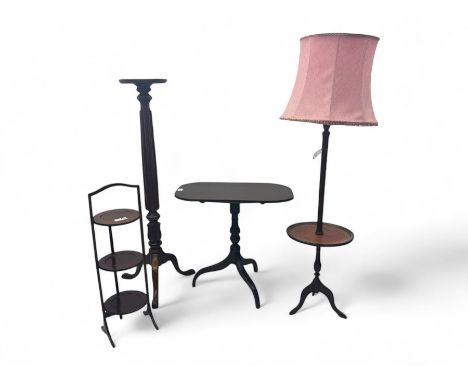 Early 20th century mahogany jardinière stand, flared circular top raised on turned and fluted columnar base with foliate carv