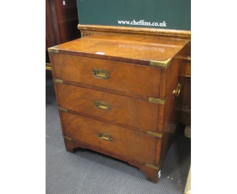 A&nbsp;19th Century style mahogany campaign chest of small proportion, having three graduating drawers and various brass fitt