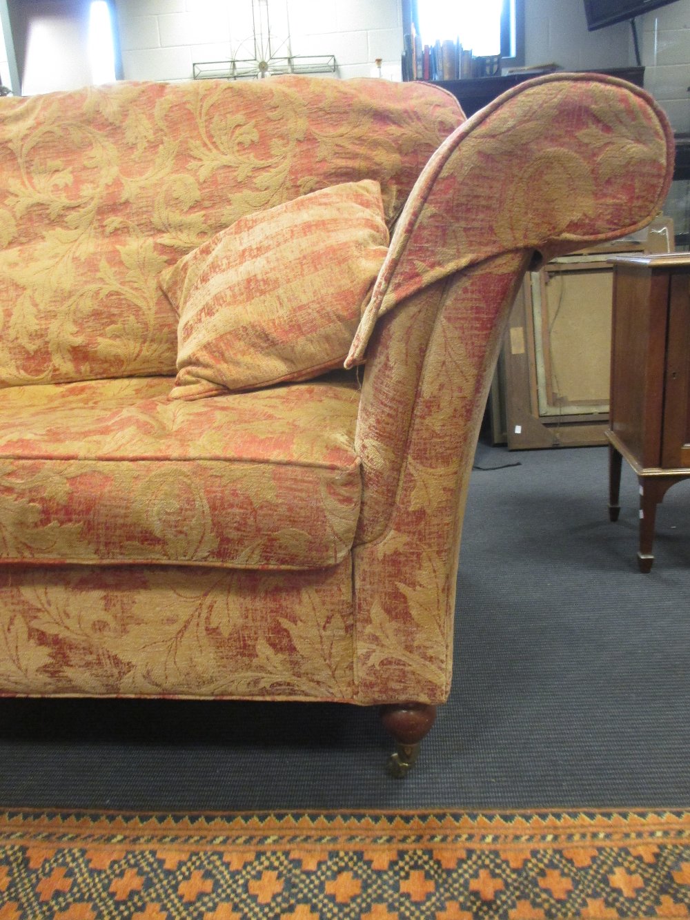 A pair of Duresta two seater sofas with loose seat cushions and on