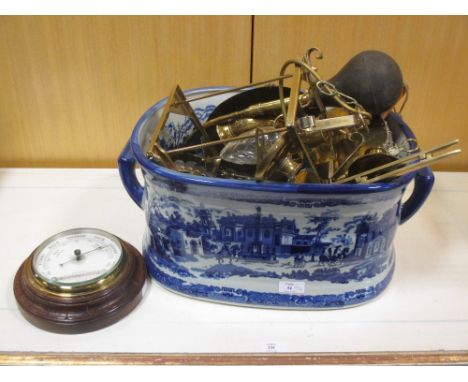 Brassware: a car horn, hall lantern, fireside tools, money box, etc together with a blue and white footbath  
