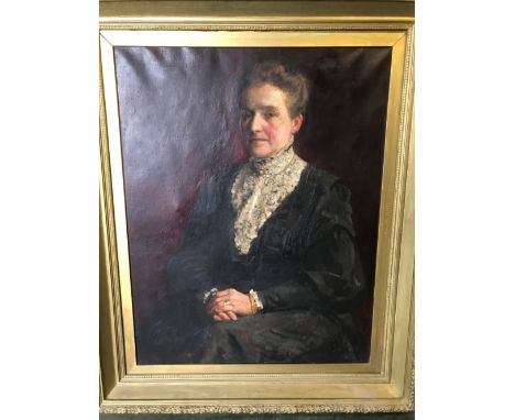 Late 19th Century English School, formal portrait of a lady, with folded hands, in a black dress, oil on canvas, 89 x 70cm  