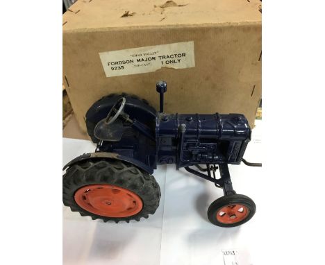 A Chad Valley Fordson Major die cast model tractor no.9235 with clockwork mechanism (not working) 19cm, damaged exhaust pipe,