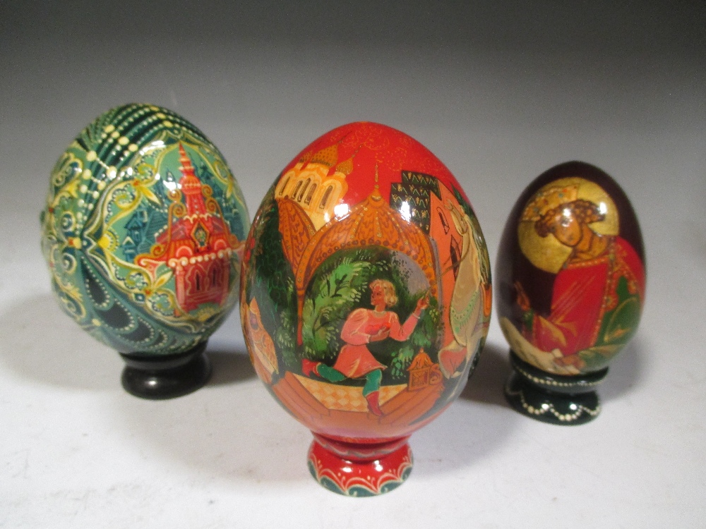 Thirteen various Russian painted eggs in - Cheffins Fine Art