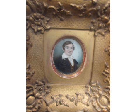 Two early 19th century portrait miniatures of young gentlemen, in a rosewood frame and a gilt frame (2)  