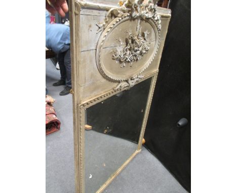 A French 19th century painted pier mirror with carved trophy &amp; ribbon tied cresting, 159cm x 95cm  