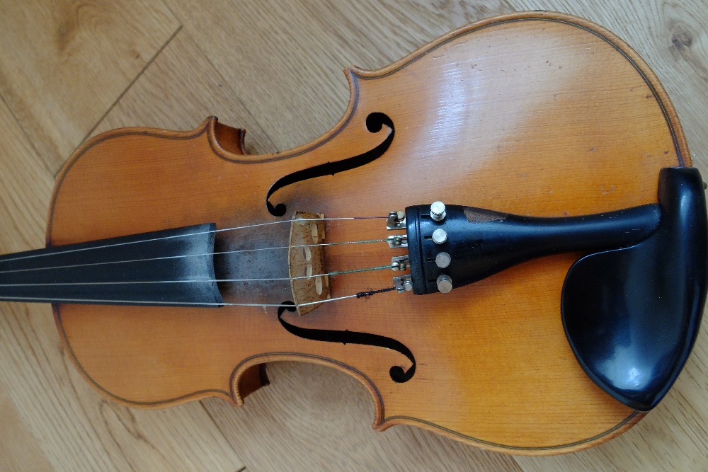 Vintage Violin with 14" back.The overall length of the Violin is 23 1/2"