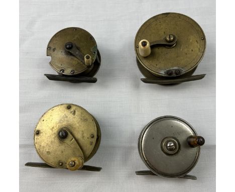 A collection of four vintage centre pin fishing reels. Largest D.8 W.3.5cm 