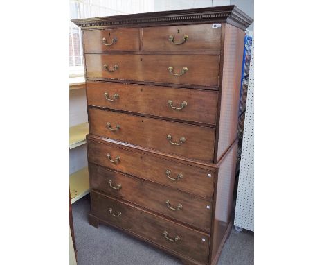 A George III mahogany chest on chest, of two short over six long graduated drawers, on bracket feet, 122cm wide x 178cm high.