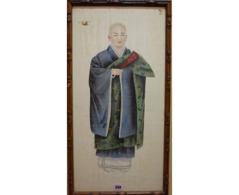 A pair of Chinese paintings, late 19th/early 20th century, opaque pigments on silk, each painted with a full length portrait 
