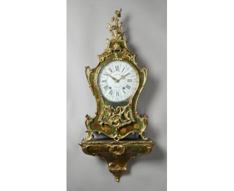 A LOUIS XV ORMOLU-MOUNTED GREEN AND FOLIATE LACQUERED BRACKET CLOCK AND BRACKETBy Bichon A MoulinThe shaped case with foliate