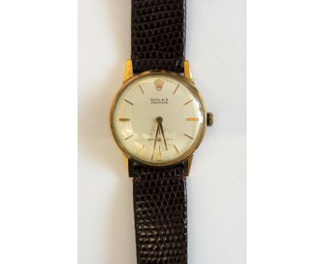 A Rolex Precision 9ct gold circular cased gentleman's wristwatch, with a signed jewelled movement, the signed silvered dial w