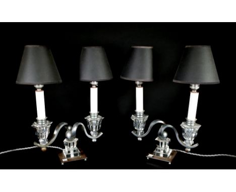 A pair of silvered metal and glass three light table lamps, 31cm wide, a pair of white metal and glass two branch table lamps