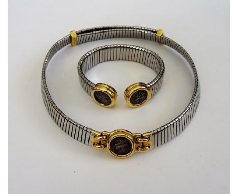 A Bvlgari gold and steel collar necklace, the front mounted with an ancient coin, detailed to the back of the setting Lokris-