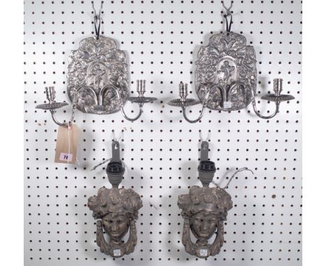 A pair of 18th century style white metal twin branch wall appliques, with relief cast figural/foliate back plates, 20.5cm hig