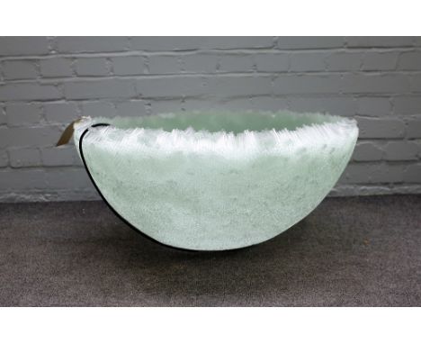 A large modern glass centrepiece of circular bowl form, the body made up of small hollow glass tubes with light source beneat