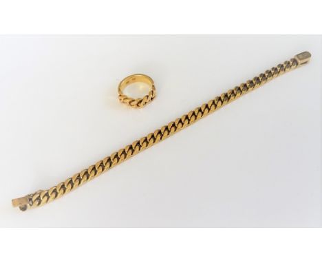 A gold bracelet, in a faceted curb link design, on a snap clasp, detailed 14K 585, length 17cm and a gold ring, in a faceted 