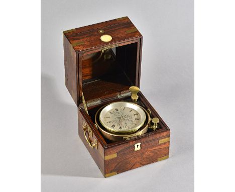 A Victorian rosewood and brass-bound chronometer By F. W. Clerke, London, No. 539Circa 1860The three-tier case with brass ban