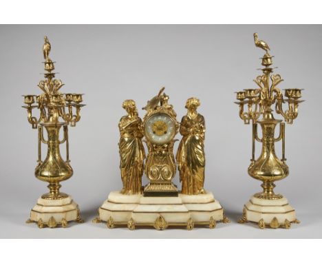 A FRENCH GILT BRASS AND ONYX GARNITURECirca 1900The clock modelled with a figure of Ceres, emblematic of summer, and another 