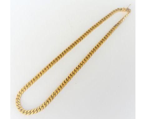 A gold faceted curb link neckchain, on a snap clasp, detailed 14 K 585, weight 73 gms.