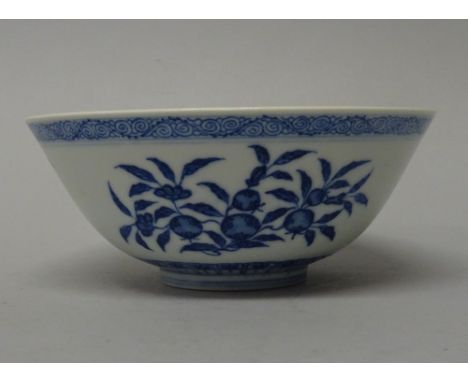 A Chinese blue and white bowl, blue Daoguang seal mark but later, painted on the exterior with branches of fruit, the interio
