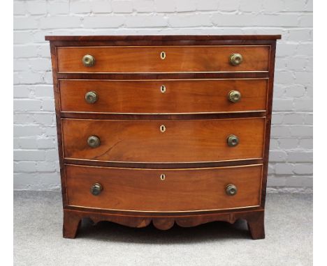 A late Regency inlaid mahogany bowfront chest of four long graduated drawers on splayed bracket feet, 97cm wide x 94cm high. 