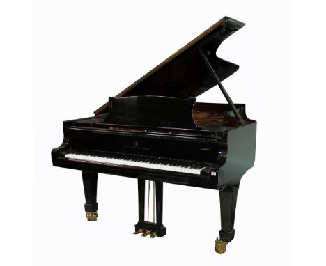 Steinway &amp; Sons; an ebonised model D Concert grand piano, circa 1999, serial number 552181, with adjustable piano bench, 