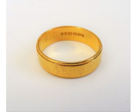 A 22ct gold wedding ring, ring size R, weight 6 gms.