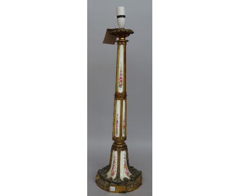 A French pottery and gilt metal mounted table lamp, late 19th century, (converted) on a circular base with foliate decoration