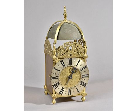 A BRASS LANTERN CLOCKSigned John Broocksted, TunbridgeOf usual form, surmounted by a bell with strapwork and turned finial, a