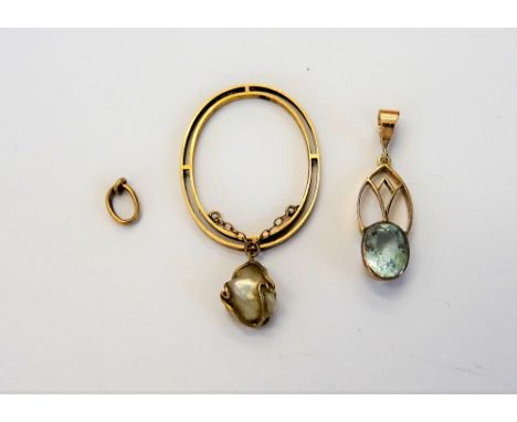 A gold and baroque cultured pearl pendant, of oval openwork form, (the suspension detached, but present) and a gold and oval 