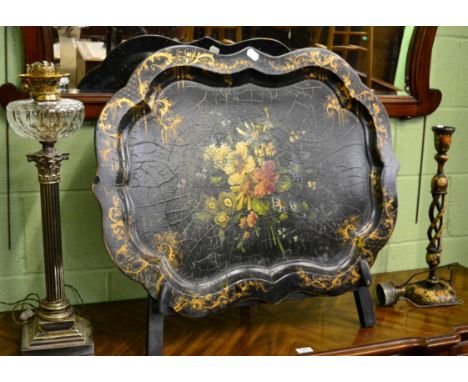 A Victorian papier mache tray painted with a floral spray, a similar candlestick, a silver plated corinthian column oil lamp 