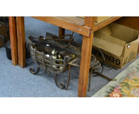 A quantity of metalwares including a fire grate, kettle, trivet, three brass weights etc, together with a glass lamp shade