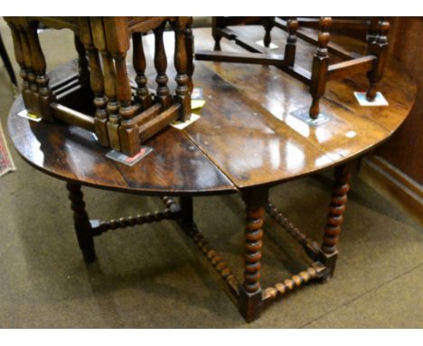 An oak gate leg dining table