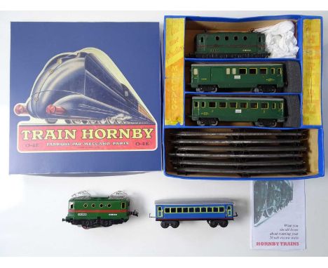 A HORNBY FRANCE O gauge 3-rail passenger train set with repaired box w/repro lid together with a smaller similar loco and car