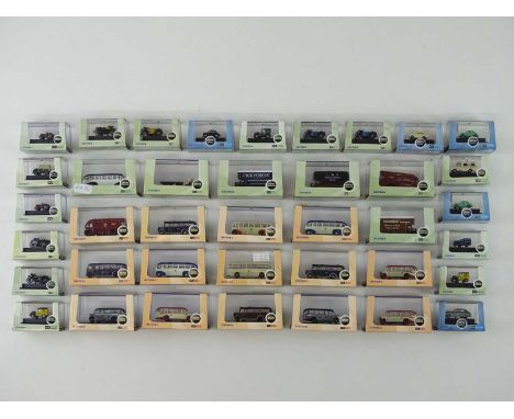 A large quantity of N scale cars, vans, buses, lorries etc. by OXFORD DIECAST - VG/E in G/VG boxes (39)