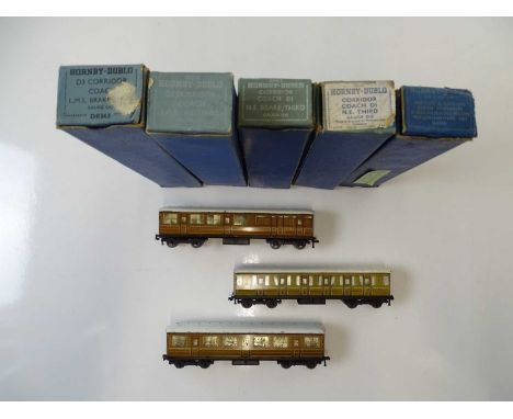 A group of HORNBY DUBLO OO gauge 3-rail coaches in LMS and LNER liveries - G/VG in G boxes (where boxed) (8)