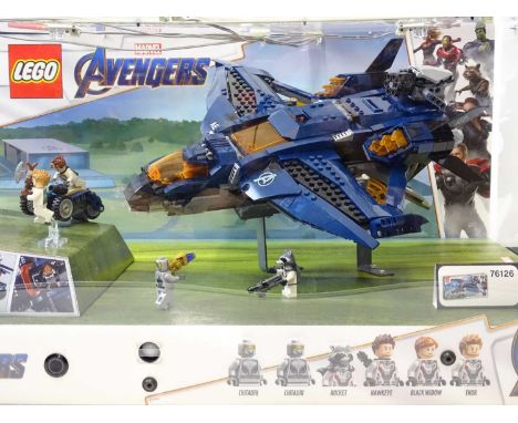 A LEGO Marvel Avengers acrylic shop display case including several internally mounted models, with internal LED lighting (not