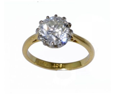 A DIAMOND SOLITAIRE RING with a round old cut diamond, gold hoop marked 18 CT PLAT, 3.2g  gross,  size K ++In very good secon